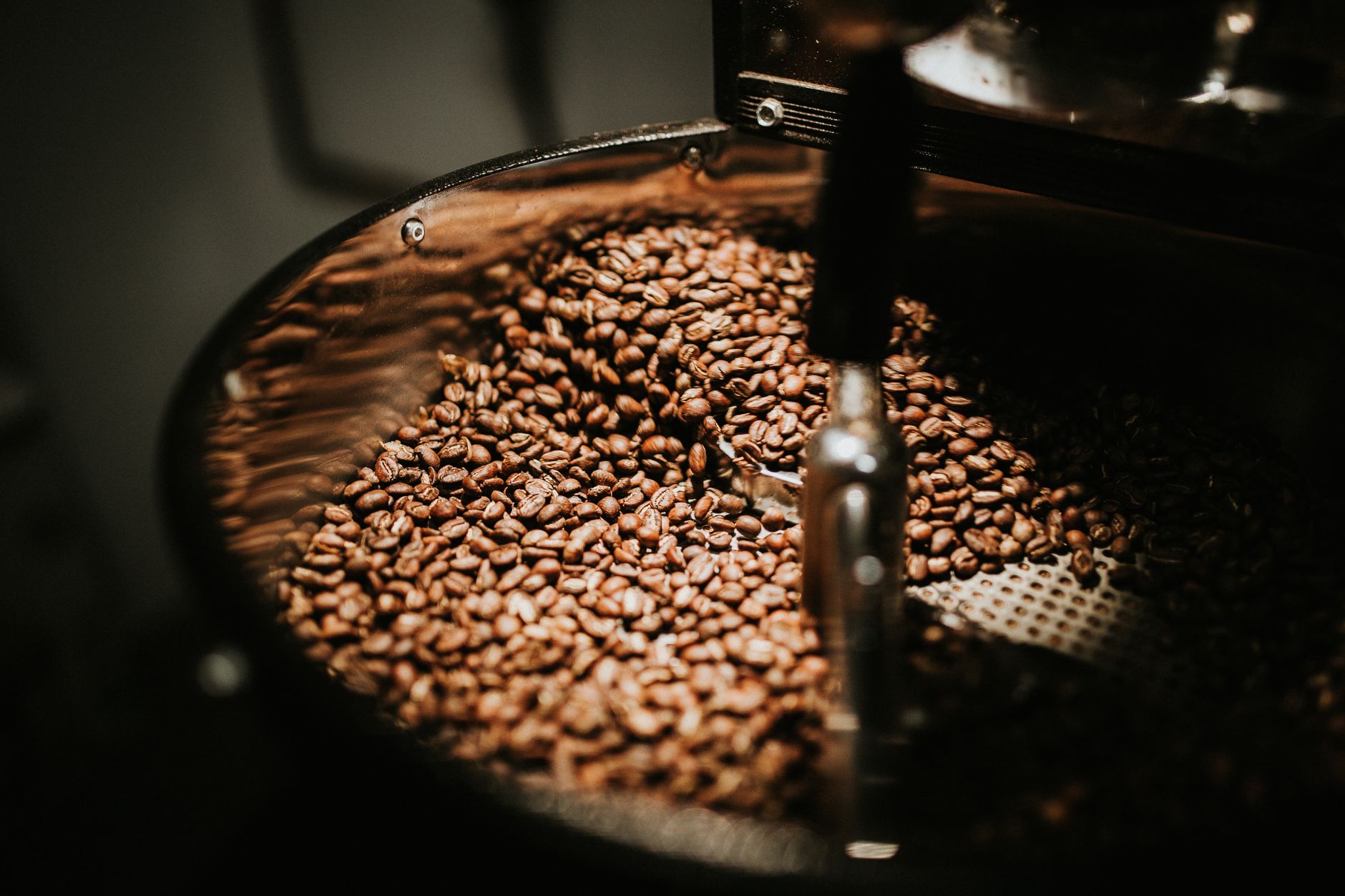 Barista serving espresso drinks at a mobile coffee bar
